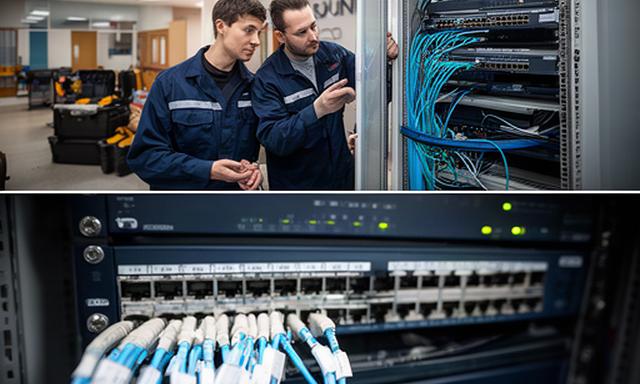 University network engineers testing fibre switches in a campus communications room